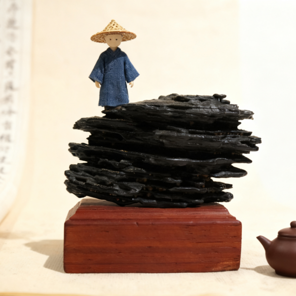 Handcrafted wind-eroded stone sculpture, natural layered rock decoration with wooden base, Zen meditation ornament